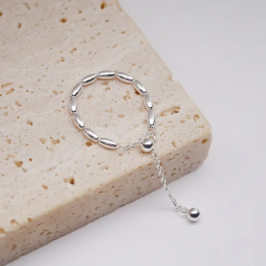 SMOOTH SURFACE TASSEL CHAIN RING