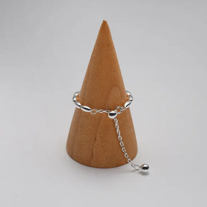 SMOOTH SURFACE TASSEL CHAIN RING