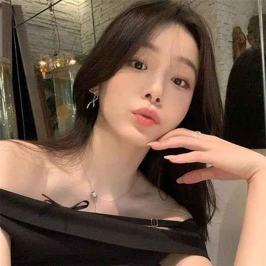 RIBBON SILVER BOW EARRINGS